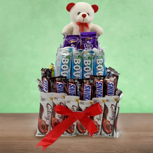 Enigmatic 4 Layer Tower Arrangement of Mixed Chocolates n Teddy