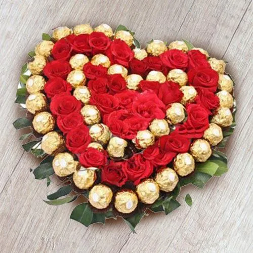 Delightful Heart Shaped Arrangement of Ferrero Rocher n Red Roses
