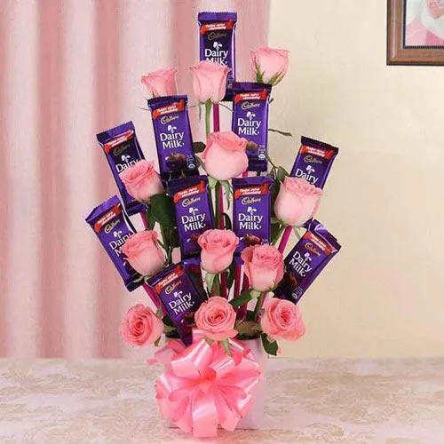 Exclusive Arrangement of Roses with Cadbury Dairy Milk Chocolates