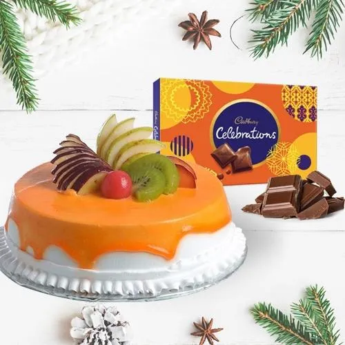 Delectable Fresh Fruits Cake with Cadbury Celebrations Pack