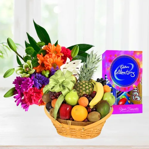 Online Fruits Basket with Cadbury Celebration Pack and Mixed Flower Bouquet