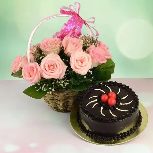 Lovely 12 Pink Roses Basket with Choco Truffle Cake 	