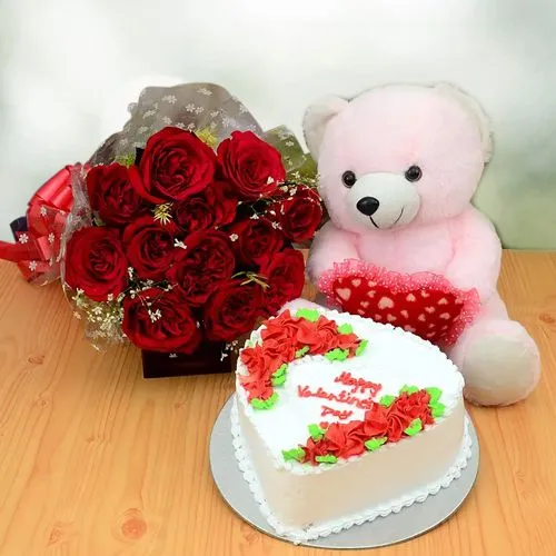 Delightful Gift of 12 Red Roses Bouquet, Pineapple Cake n Pink Teddy