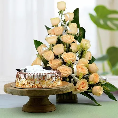 Delectable Butterscotch Cake with Elegant Peach Roses Basket	
