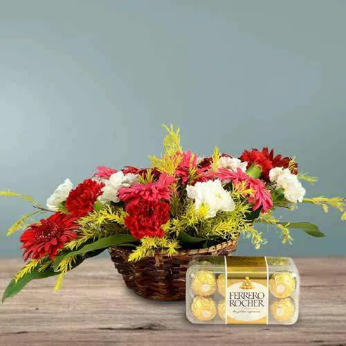 Expressive Basket of Pink Gerberas n Mixed Carnation with Ferrero Rocher
