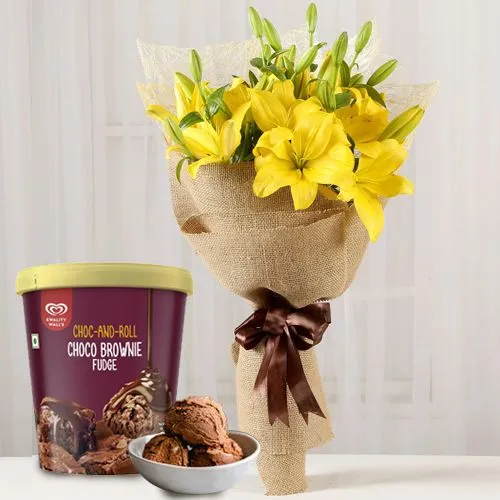 Glamorous Yellow Lily Bouquet with Kwality Walls Choco Brownie Fudge Ice Cream