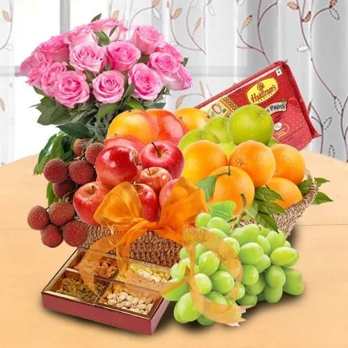 Basket of 2 kg Fresh Fruits Basket & Haldiram Soan Papdi and Pink Rose Bouquet for your Mom