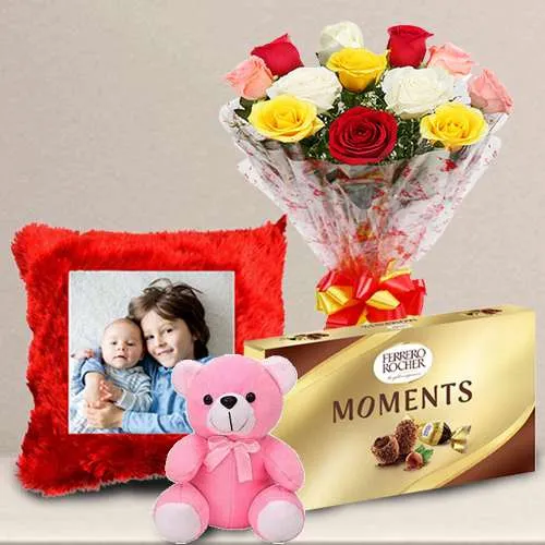 Magnificent Roses Bouquet N Personalized Cushion with Ferrero Moments N Teddy	