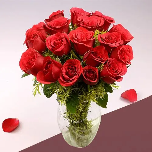 Artistic Display of Red Roses in Crystal Vase