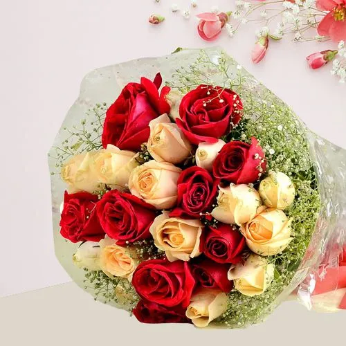 Magnificent Bouquet of Peach N Red Roses with Greens	