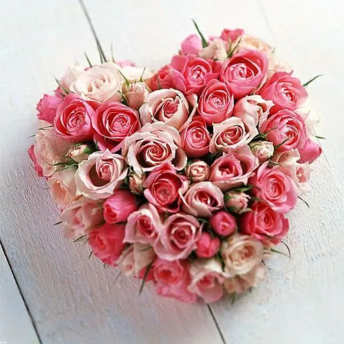Luxurious Heart Shape Peach N Pink Roses Bouquet