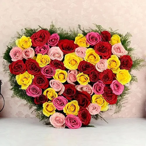 Mesmerizing Heart Shape Bouquet of Colorful Roses