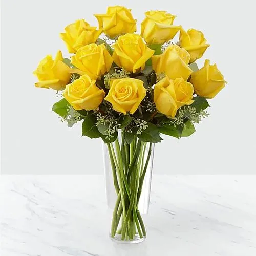 Soft Array of Long Stemmed Yellow Roses in a Vase