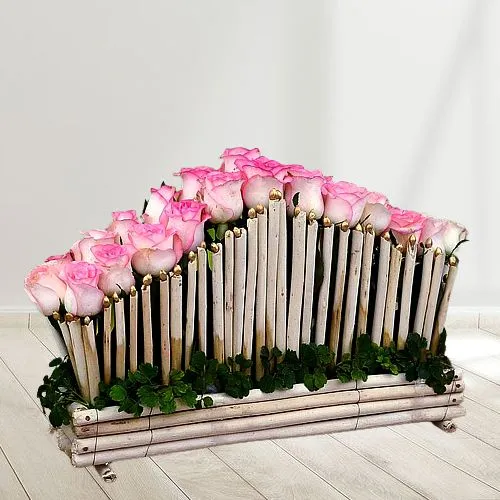 Impressive Arrow Shaped Basket of Pink Roses