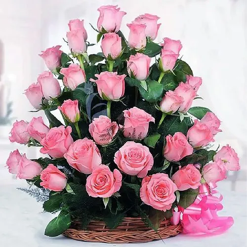 Bright Basket of Long Stemmed Pink Roses with a Bow