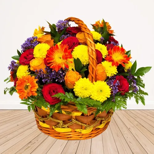 Pristine Basket of Mixed Seasonal Flowers with Green Fillers