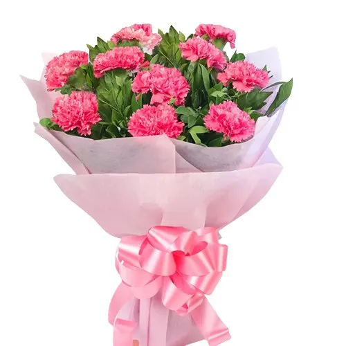 Deliver this petite Hand Bunch of Pink Carnations in Tissue Packing