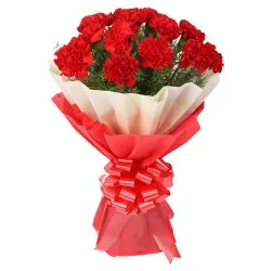 Now deliver this delicate Hand Bunch of Red Carnations in tissue