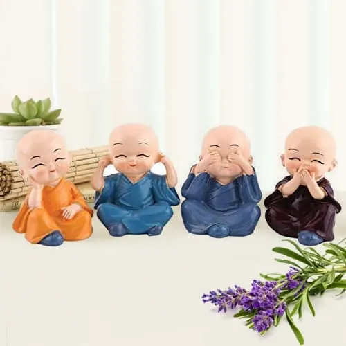 Outstanding Set of 4 Buddha Monks Figurines