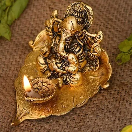 Lovely Ganesh on Leaf with Diya for Spiritual Mummy