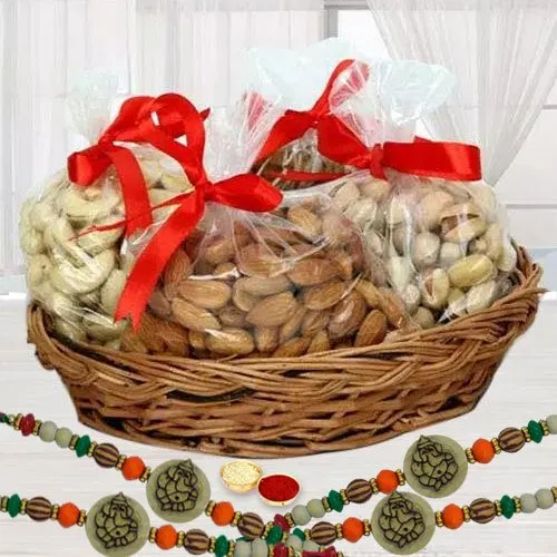 Lovely Gift of 4 Ganesh Rakhis with Exotic Dry Fruits Basket