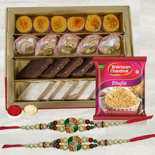 Ravishing Stone Rakhi Pair with Delicious Snacks N Sweets