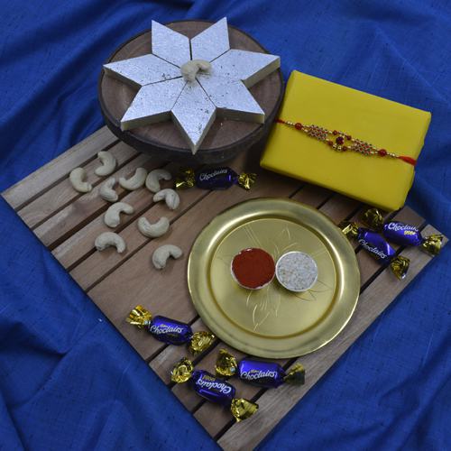 Marvelous Stone Rakhi with Haldiram Kaju Katli, Chocolate N Puja Thali