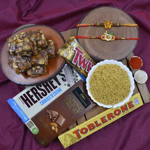 Fancy Rakhi Set with Haldiram Sweets  N  Savory N Chocolates Hamper